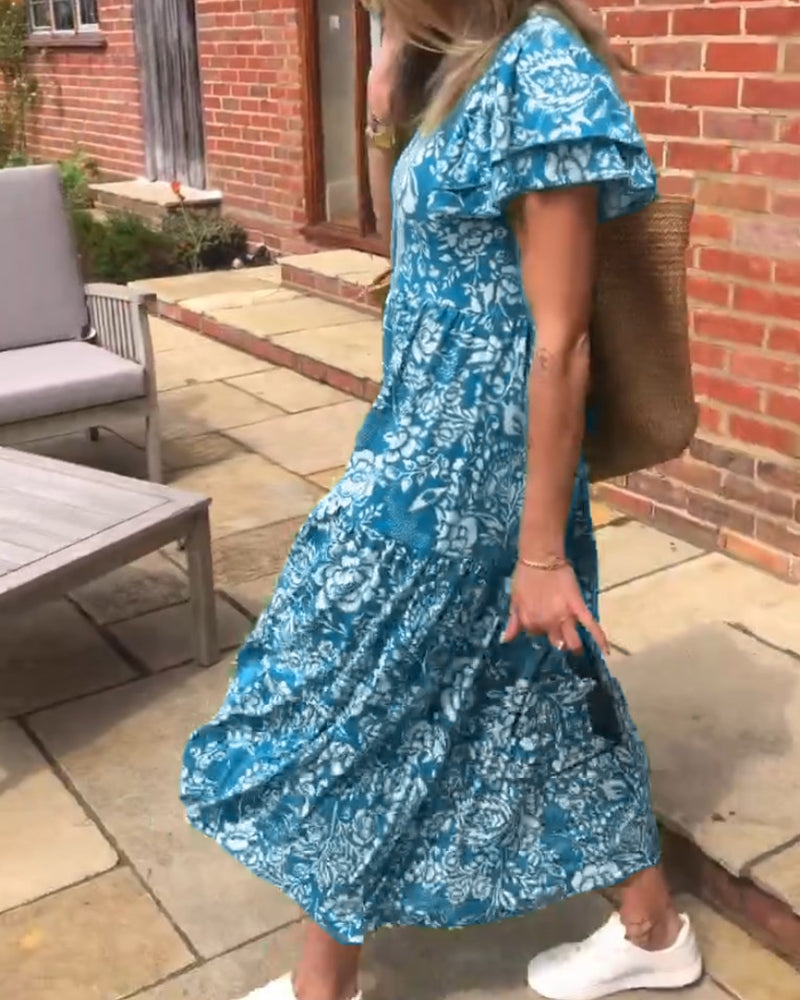 Lange jurk met korte mouwen en bloemenprint
